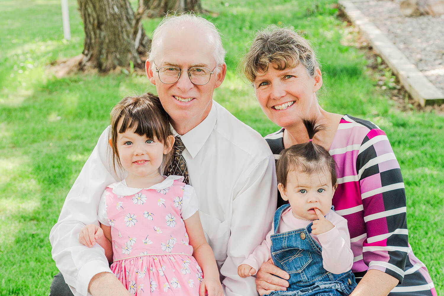 grandparents with their granddaughters