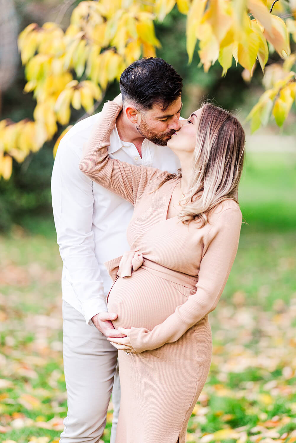 woman holding her pregnant belly